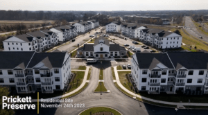 Aerial view of a residential complex with multiple buildings, roads, and parked cars, marked with the text: "Prickett Preserve, Residential Site, November 24th 2023.