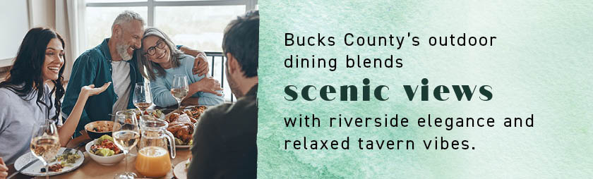 Four friends share laughs over a meal at one of the best restaurants in Bucks County, by a sunlit window.
