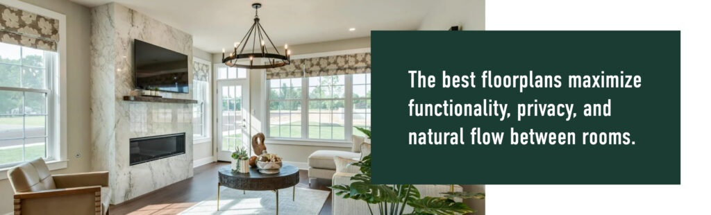 A modern living room with large windows, a fireplace, and a text box to choose your ideal 2026 floorplan.